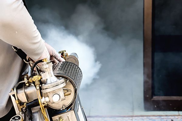 a-pest-tech-performing-a-fumigation