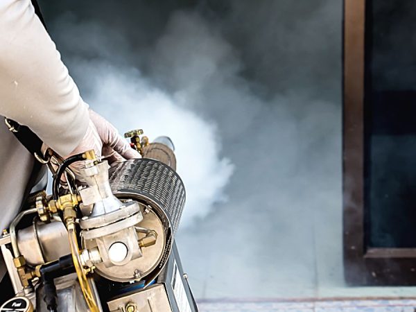 a-pest-tech-performing-a-fumigation